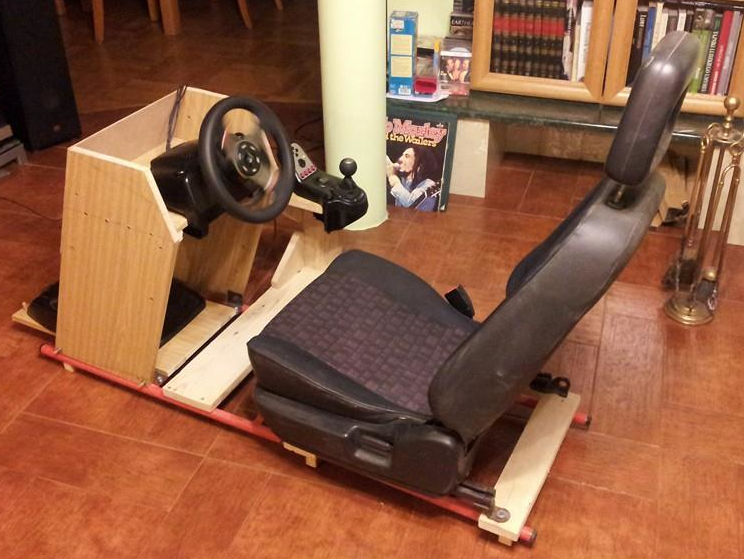 Photo of mentioned racing chair with wheel mounted
